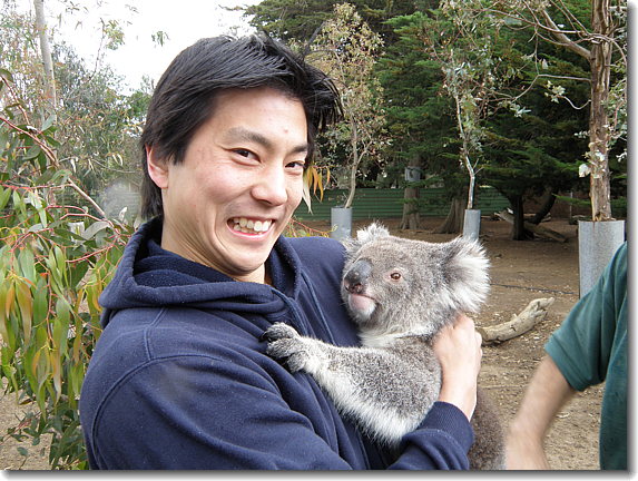 Satoshi holding Koala